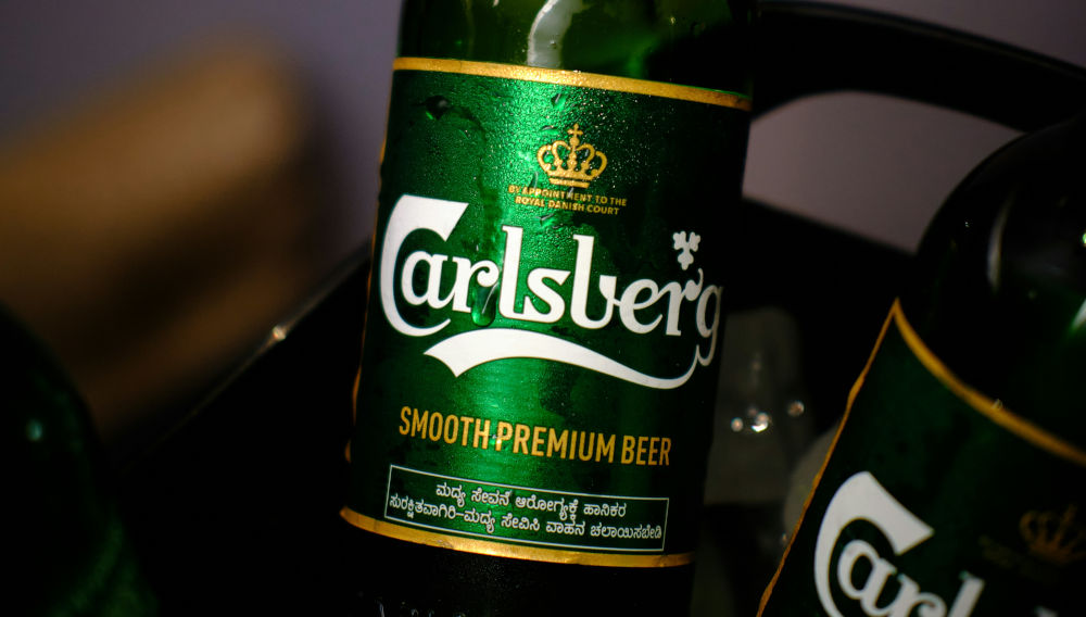 Carlsberg bottle (Photo: Himanshu Choudhary on Unsplash)