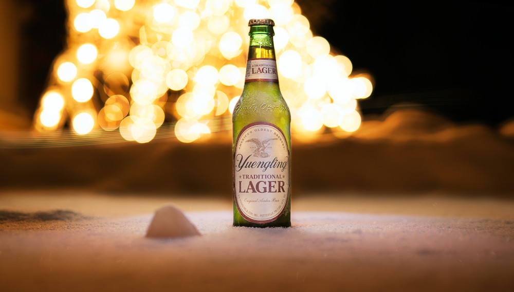 Yuengling beer bottle in the snow (Photo: Joseph Gonzalez on Unsplash)