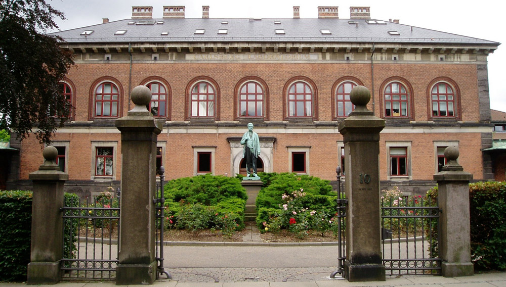 The Carlsberg laboratories with a statue of founder J. C. Jacobsen in the foreground